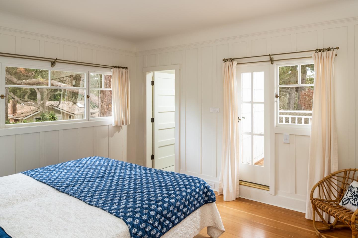 0 Northwest Nw Corner Carmel, CA 93921 - Photo 8 of 17 a bedroom with a bed and wooden floor