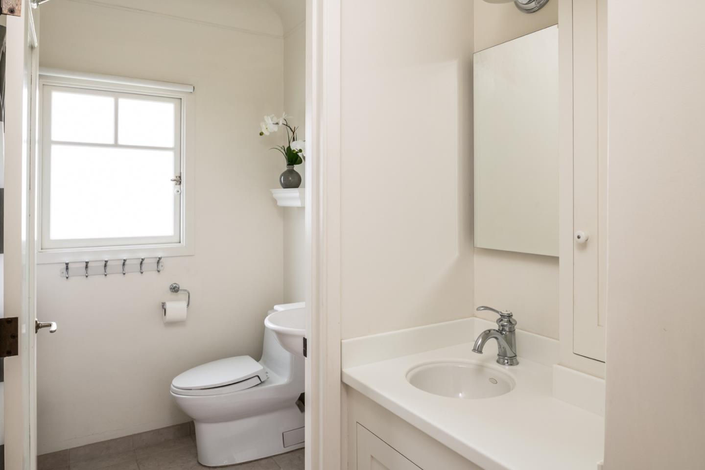 0 Northwest Nw Corner Carmel, CA 93921 - Photo 9 of 17 a bathroom with a sink a toilet and a window