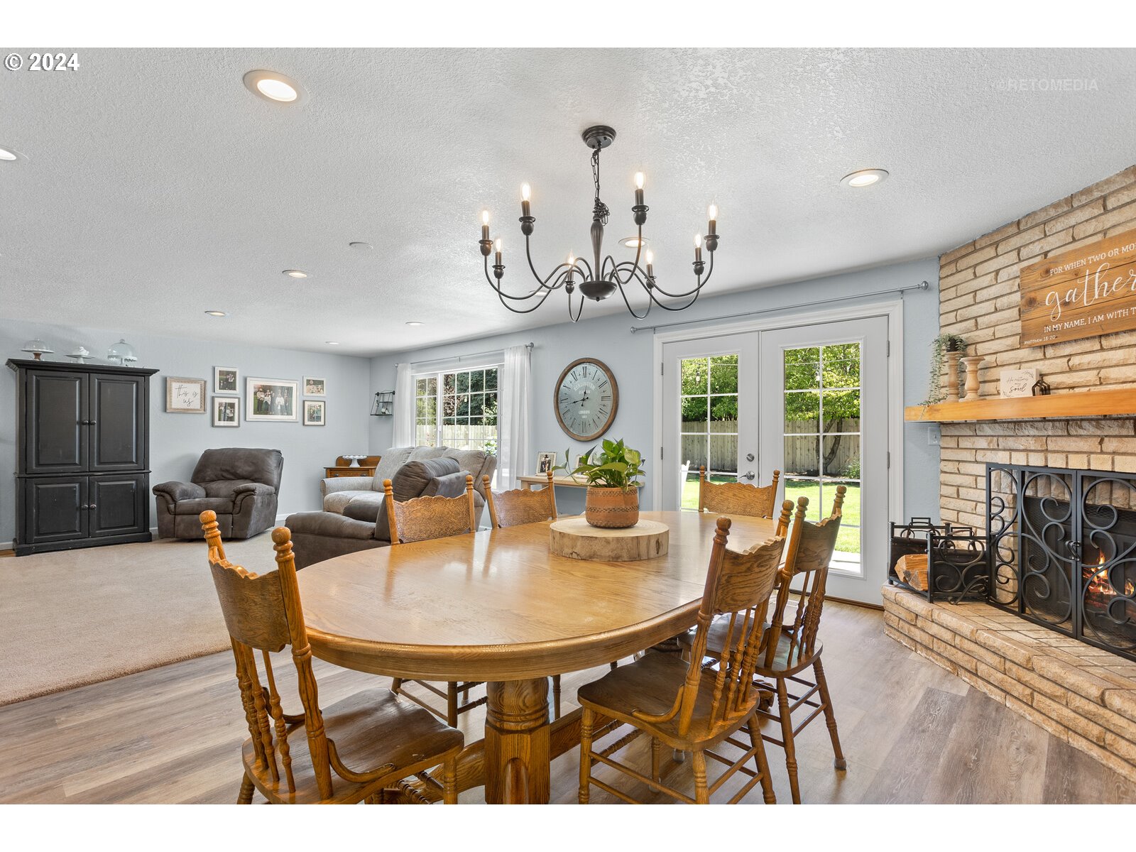 780 South Elm Court Canby, OR 97013 - Photo 14 of 32 a view of a dining room with furniture window and outside view