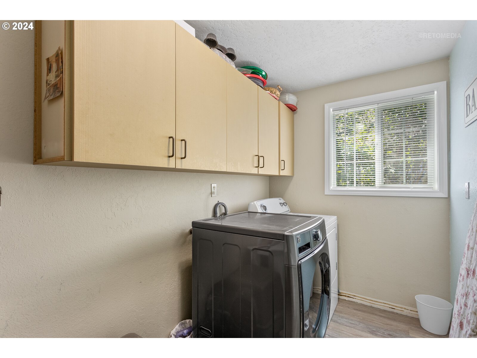 780 South Elm Court Canby, OR 97013 - Photo 25 of 32 a utility room with closet dryer and washer