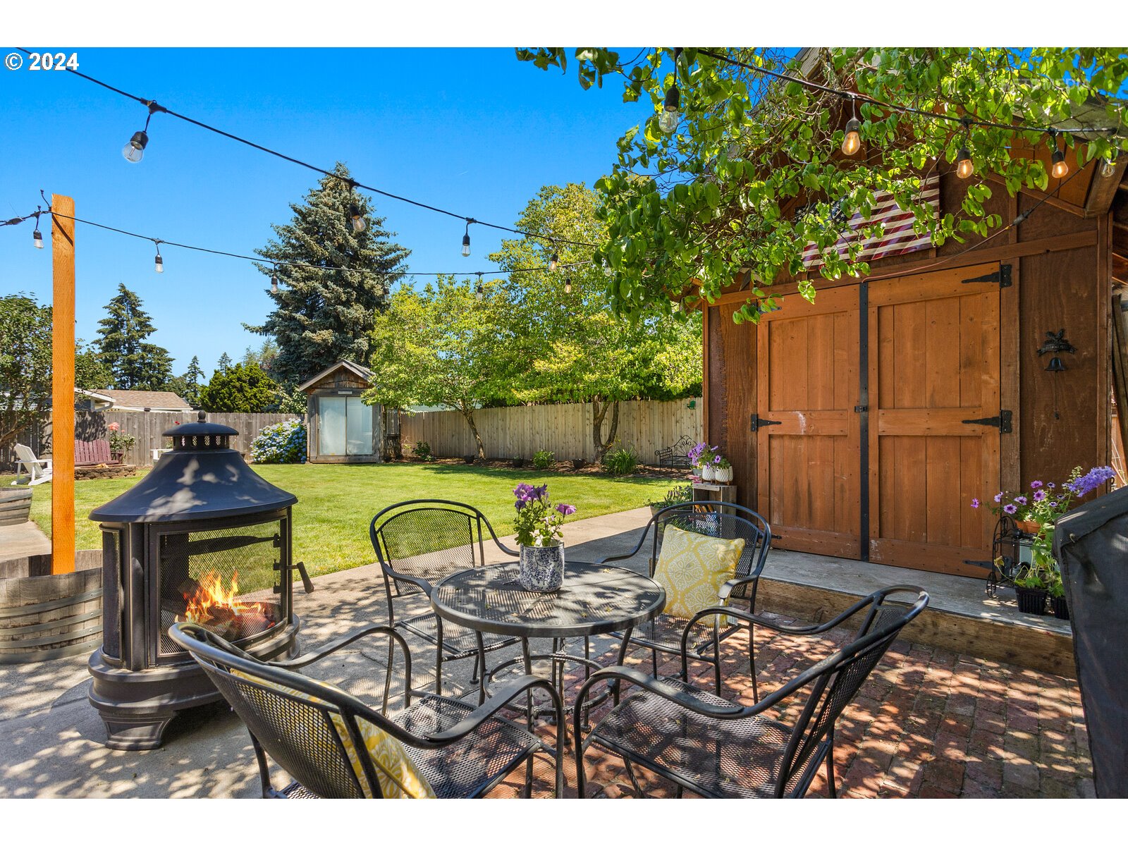 780 South Elm Court Canby, OR 97013 - Photo 28 of 32 a view of a chairs and table in the patio