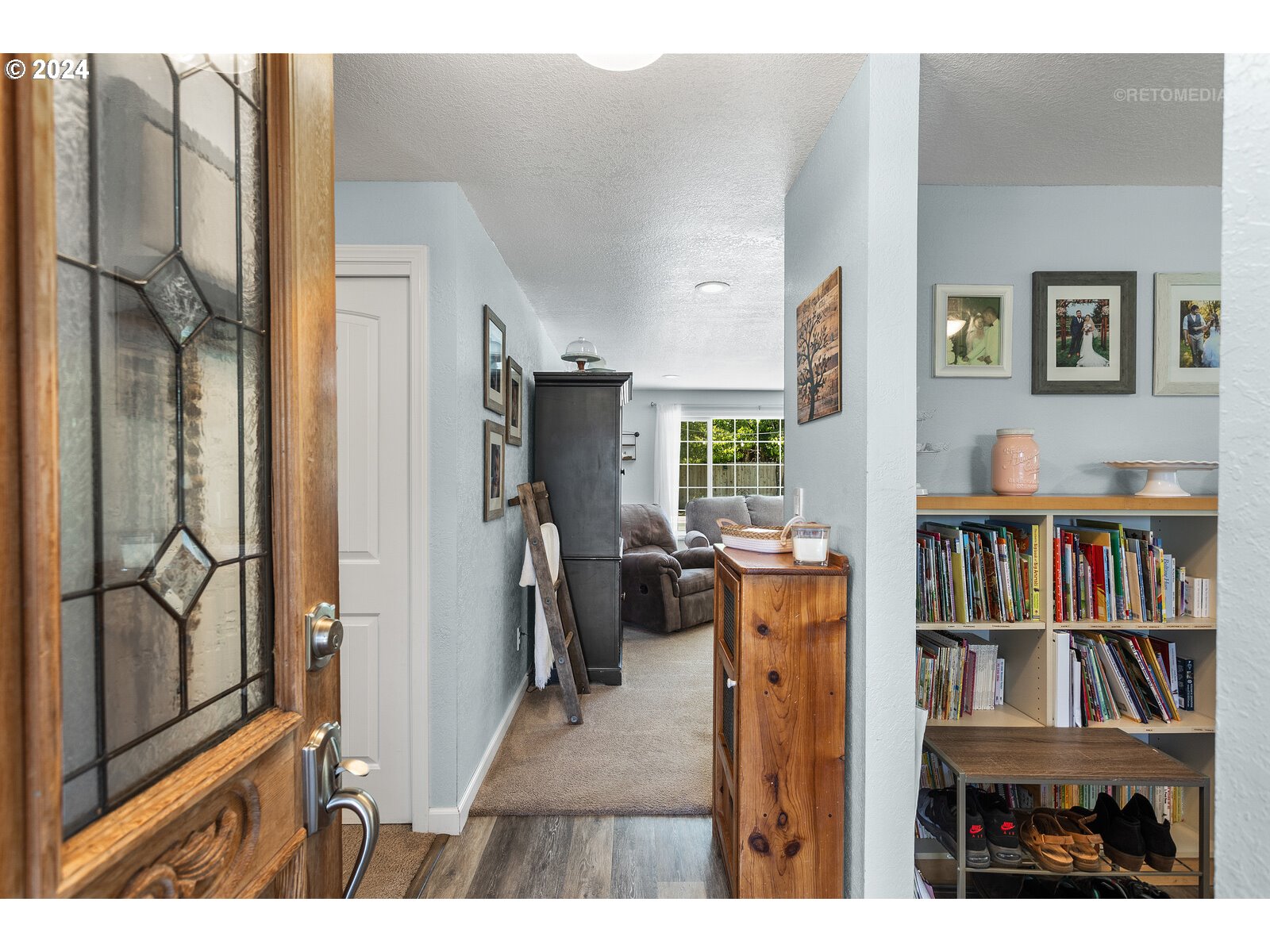 780 South Elm Court Canby, OR 97013 - Photo 5 of 32 a view of living room and workspace