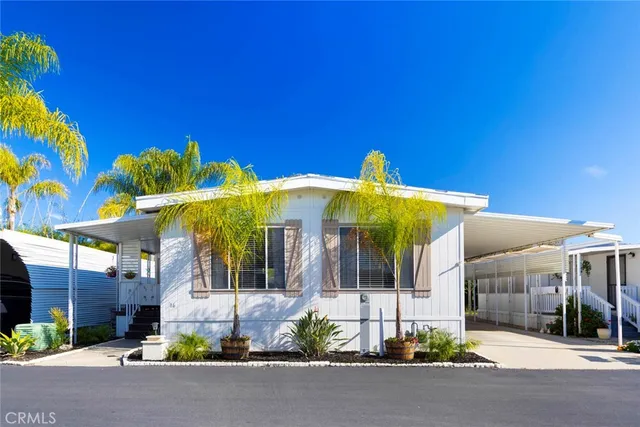 a front view of a house with a garage