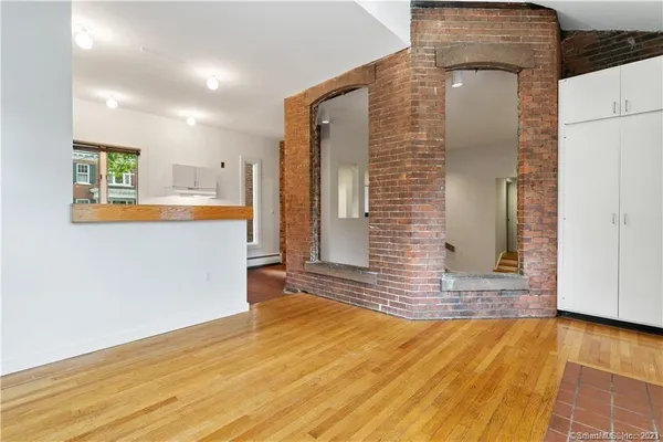 a view of a kitchen cabinets and a kitchen counter top space