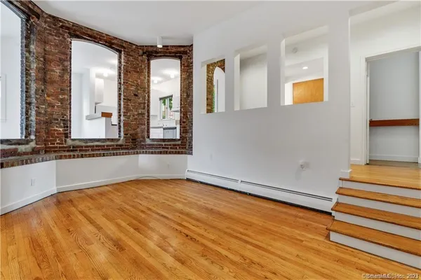 a view of an empty room and window