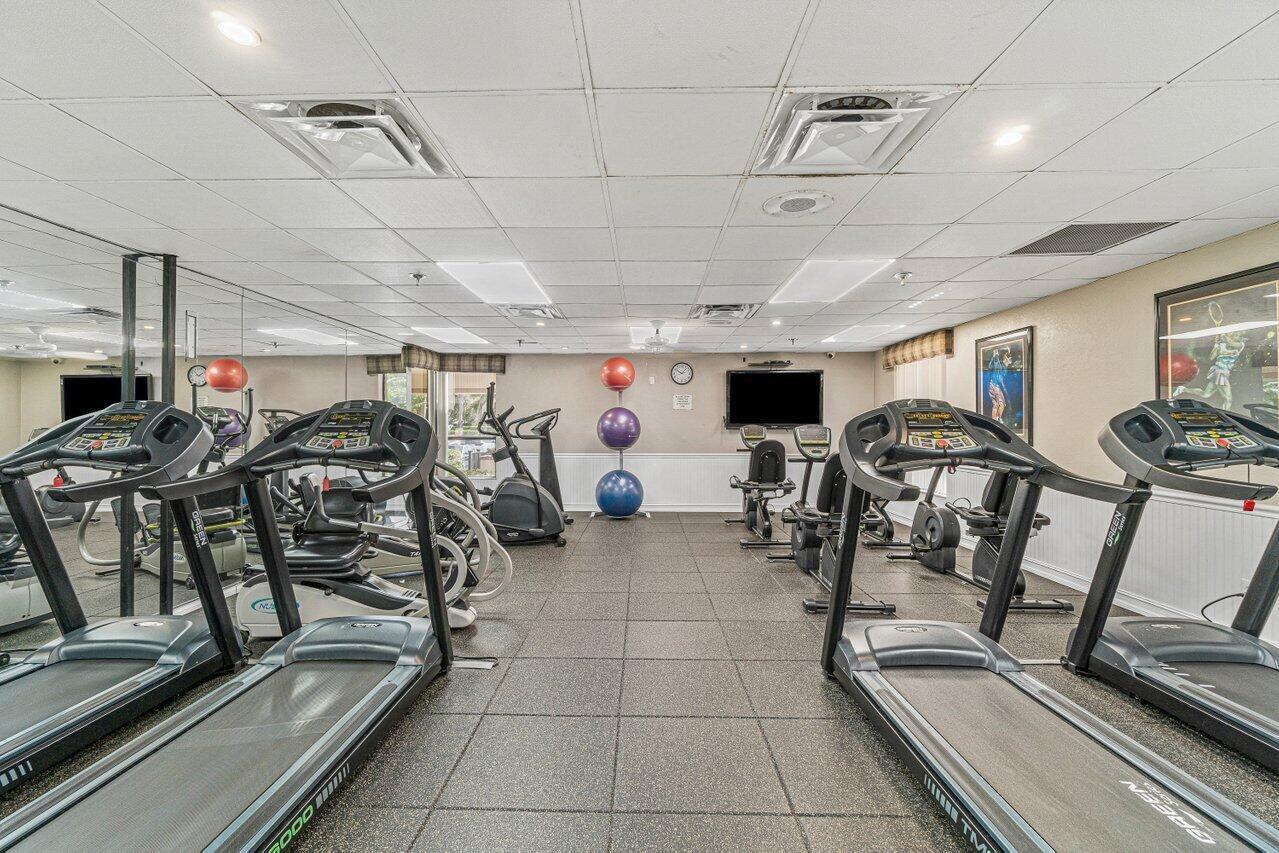 5120 Golfview Court, Unit 1722 Delray Beach, FL 33484 - Photo 27 of 46 a view of a room with gym equipment