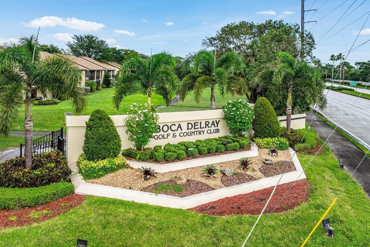 5120 Golfview Court, Unit 1722 Delray Beach, FL 33484 - Photo 29 of 46 a view of yard with green space