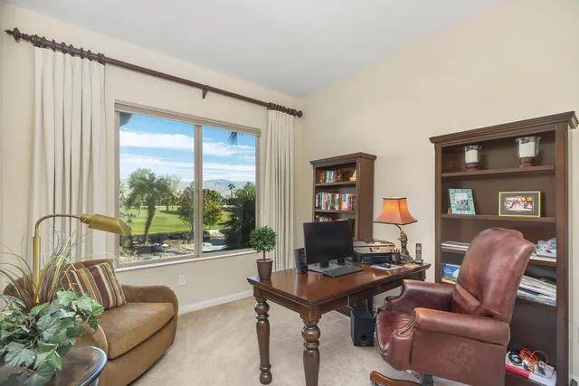 a en suite bathroom with a shower and a sink