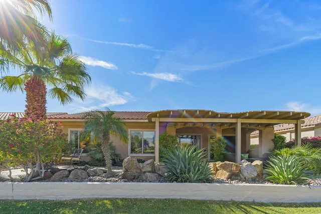 a view of a city with palm trees