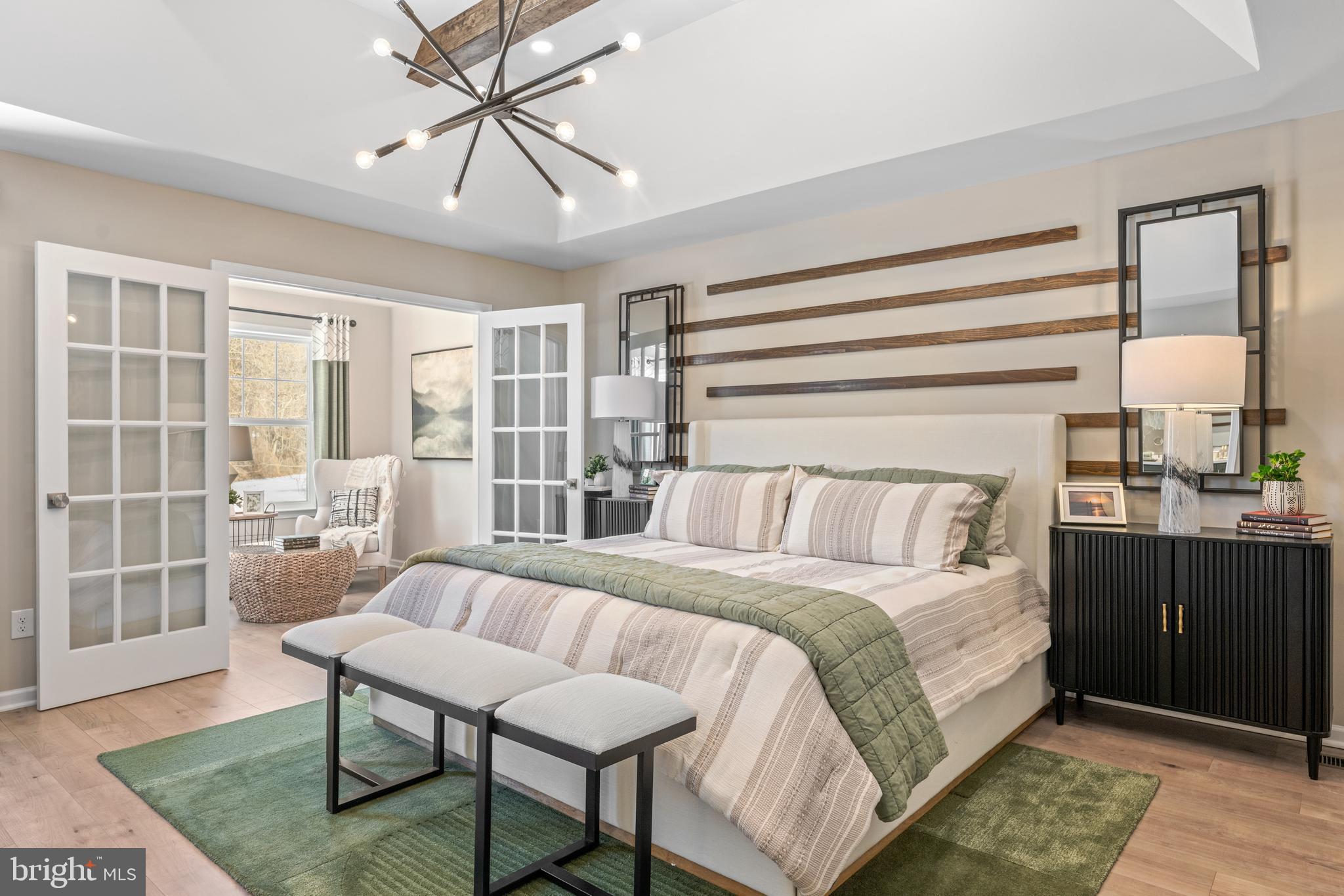 150 Foragers Lane Kennett Square, PA 19348 - Photo 19 of 33 a bedroom with a bed and wooden floor