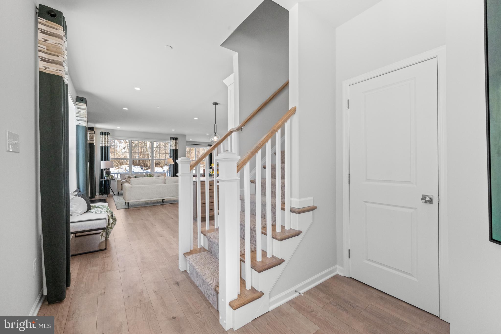 150 Foragers Lane Kennett Square, PA 19348 - Photo 2 of 33 a view of entryway and livingroom with wooden floor