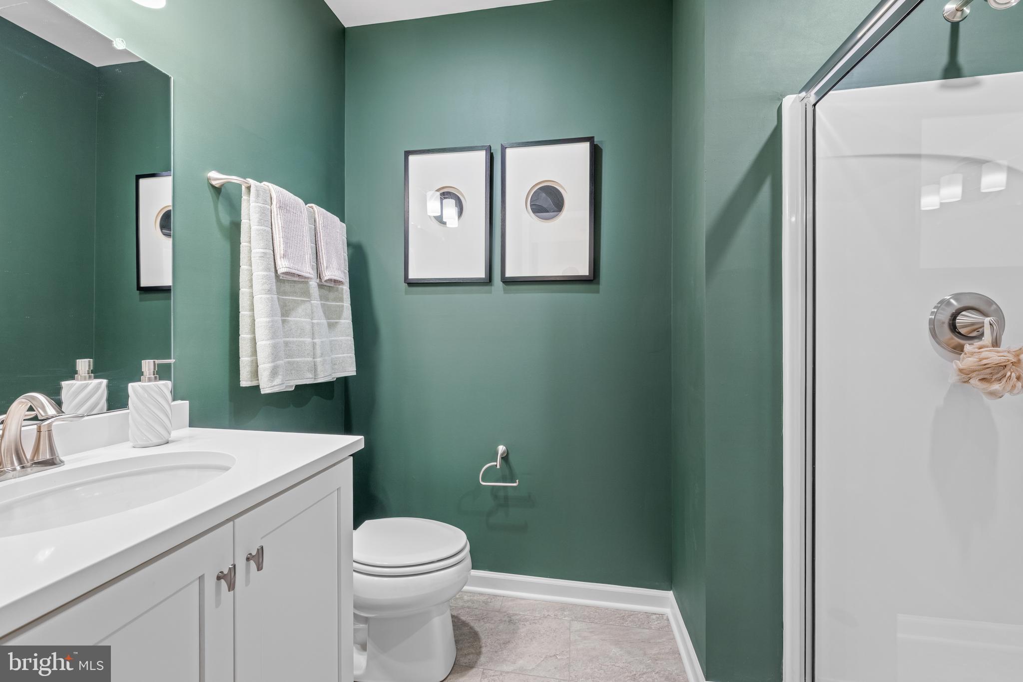 150 Foragers Lane Kennett Square, PA 19348 - Photo 26 of 33 a bathroom with a sink toilet and a mirror