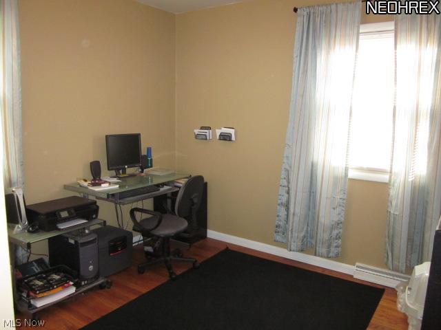 2411 Liberty Road Stow, OH 44224 - Photo 11 of 25 This bedroom #3 (main floor) is used as an office, also has refinished hardwood floors.