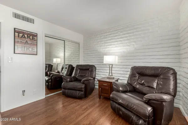 a view of a livingroom with furniture and a couch