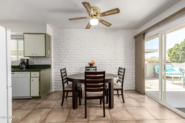 a kitchen with a sink cabinets and stainless steel appliances