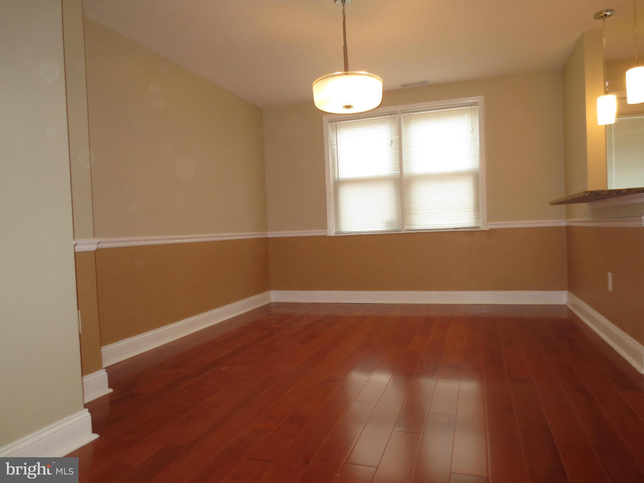 3807 Monterey Road Baltimore, MD 21218 - Photo 7 of 29 Chair Rail and Two-tone paint design