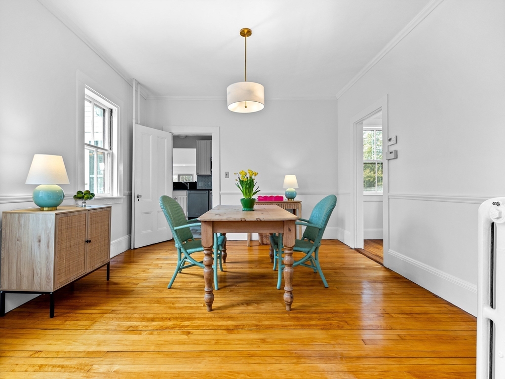 41 Rice Street Wellesley, MA 02482 - Photo 4 of 24 a view of a dining room with furniture and wooden floor