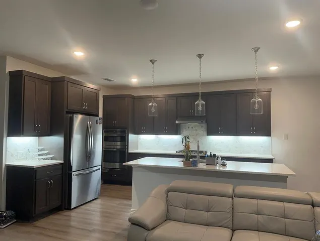 a living room with furniture and a rug