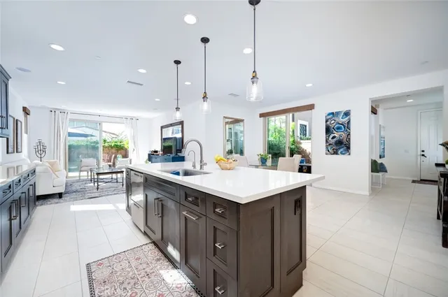 a kitchen with a stove and a refrigerator