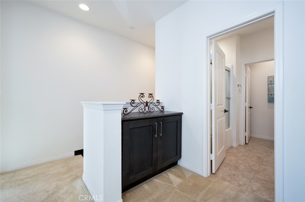 126 Brambles Irvine, CA 92618 - Photo 28 of 59 a bathroom with a sink and a mirror