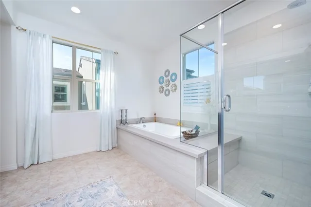 a view of living room with furniture and a window