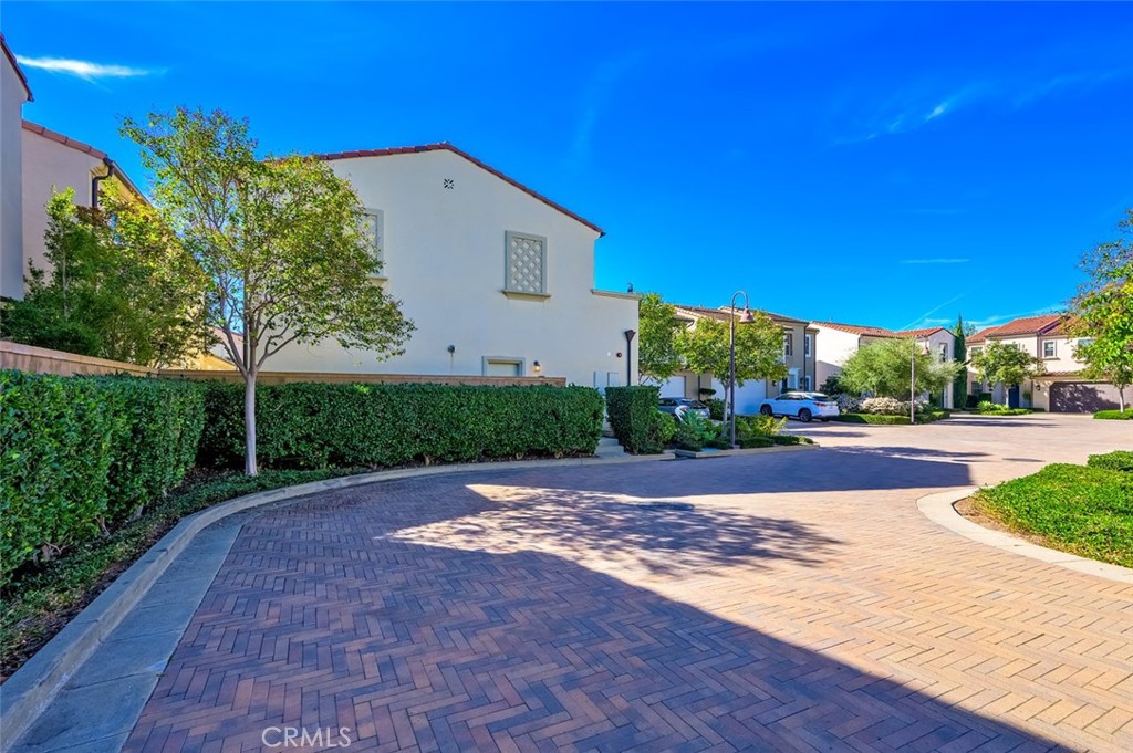 126 Brambles Irvine, CA 92618 - Photo 56 of 59 a view of a house with a yard