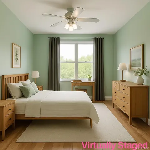 a bedroom with a bed dresser and a window