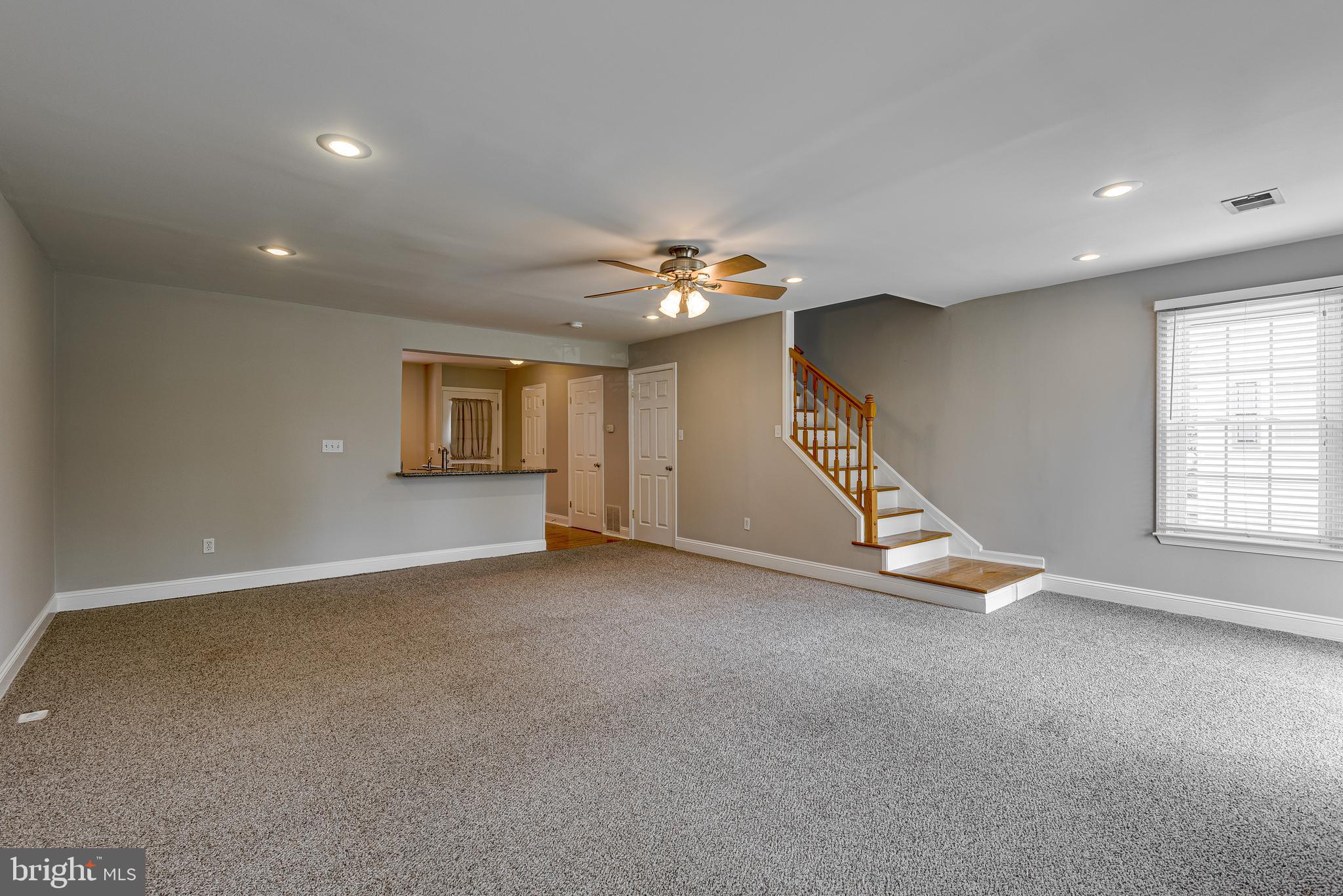1663 Hart Court Crofton, MD 21114 - Photo 11 of 40 Living room with view of stairs