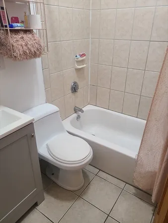 a bathroom with a sink and toilet
