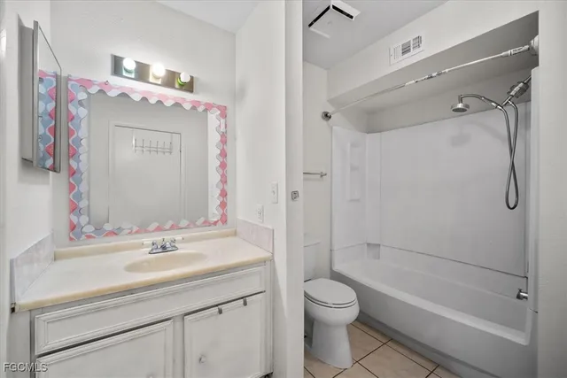 a bathroom with a sink a toilet and a bathtub