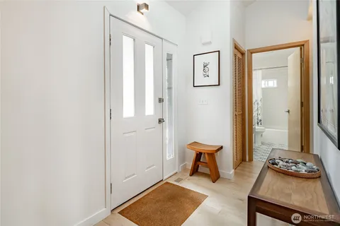 a room with furniture and wooden floor