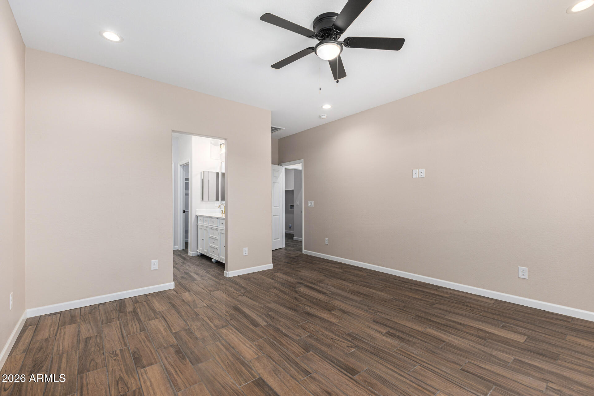 14058 South Tampico Road Arizona City, AZ 85123 - Photo 24 of 37 an empty room with wooden floor and windows