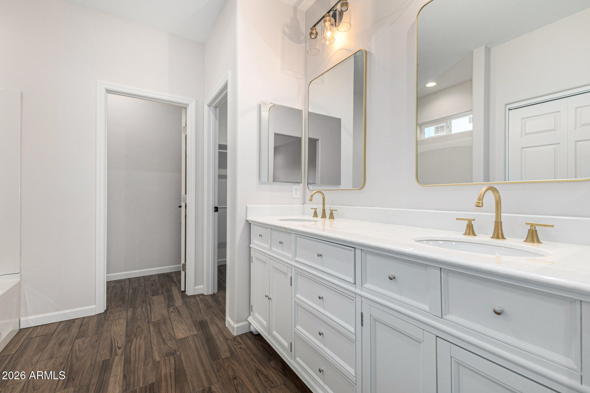 14058 South Tampico Road Arizona City, AZ 85123 - Photo 26 of 37 a spacious bathroom with a double vanity sink and mirror