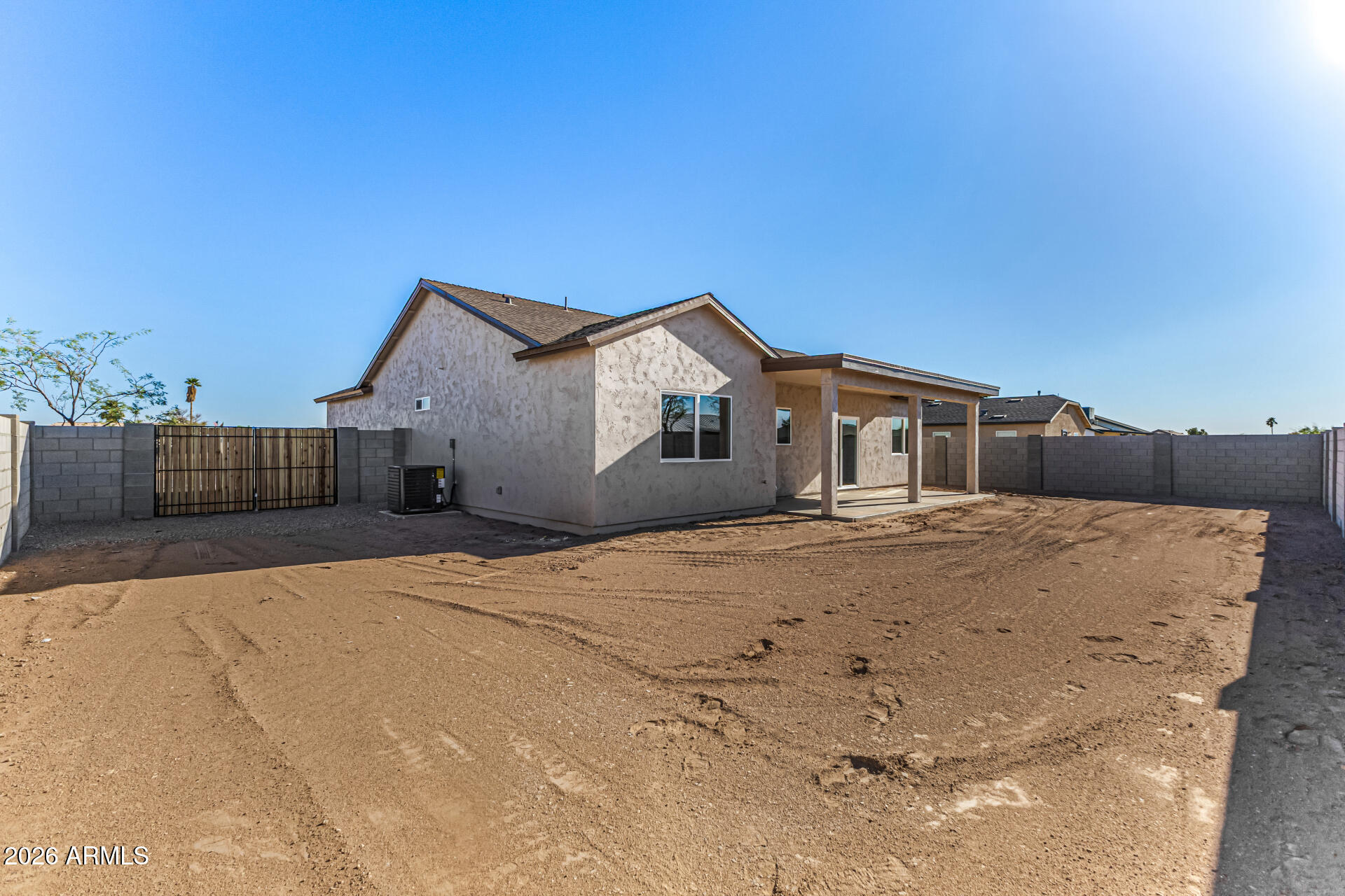14058 South Tampico Road Arizona City, AZ 85123 - Photo 37 of 37 a front view of a house with a yard