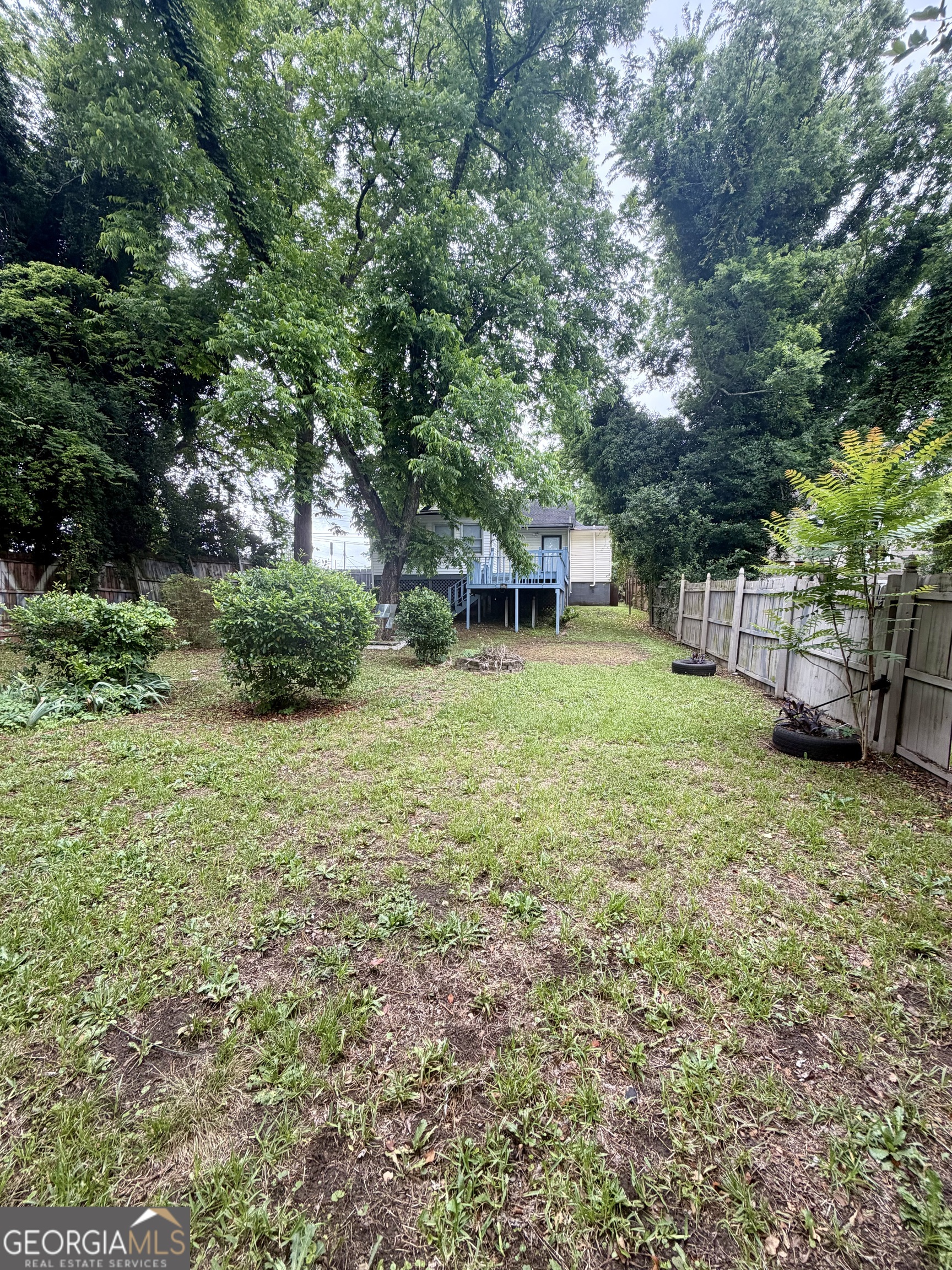 666 Woolfolk Street Macon, GA 31217 - Photo 59 of 60 a view of a backyard with a garden
