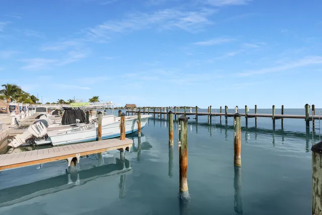 a view of a house with swimming pool yard and outdoor seating