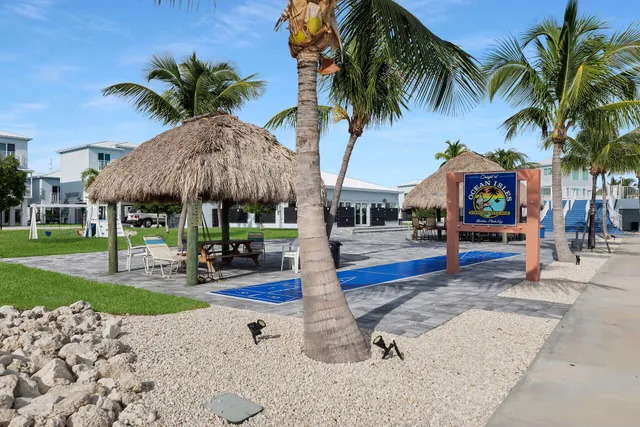 a view of living room with furniture and a potted plant
