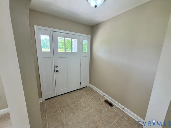 an empty room with windows