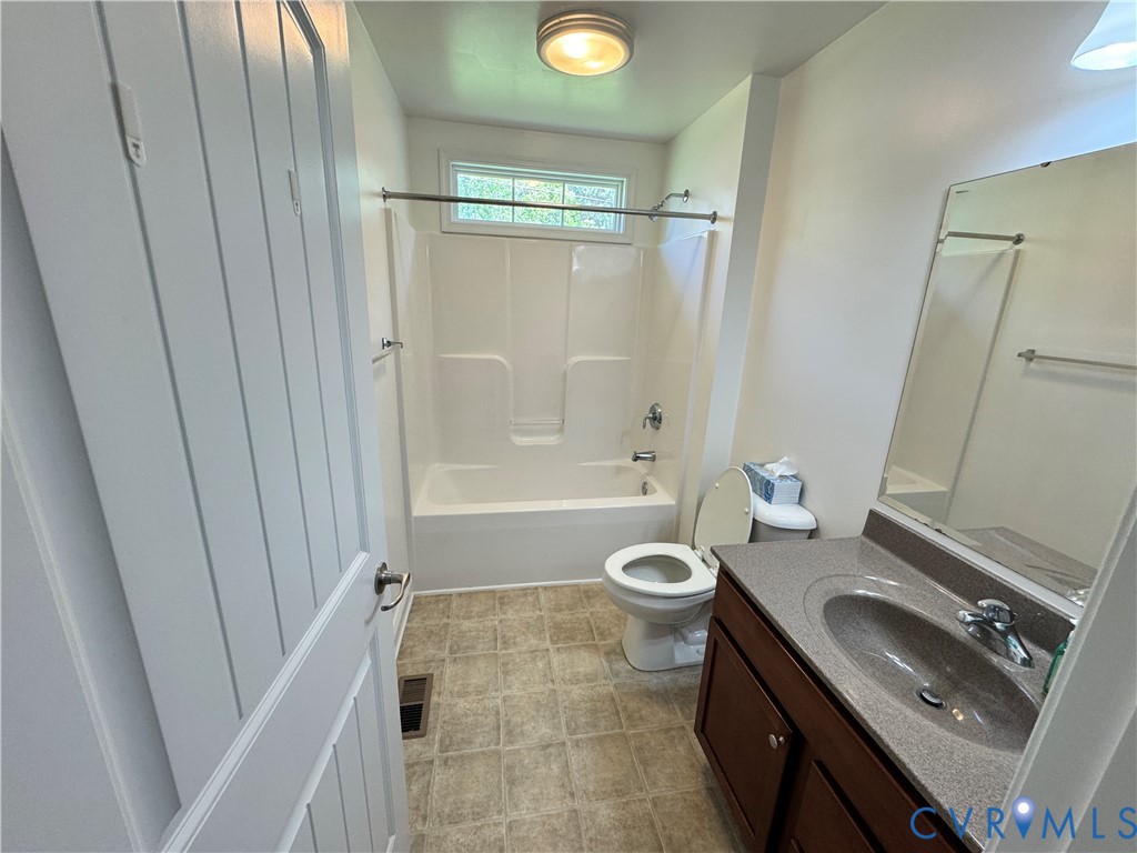 5541 Mary Ball Road Lancaster, VA 22503 - Photo 21 of 50 a bathroom with a sink a toilet and shower