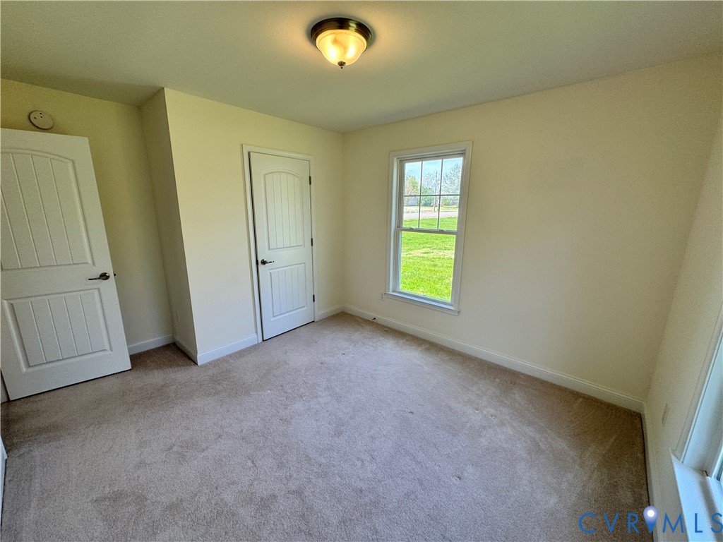5541 Mary Ball Road Lancaster, VA 22503 - Photo 23 of 50 an empty room with windows