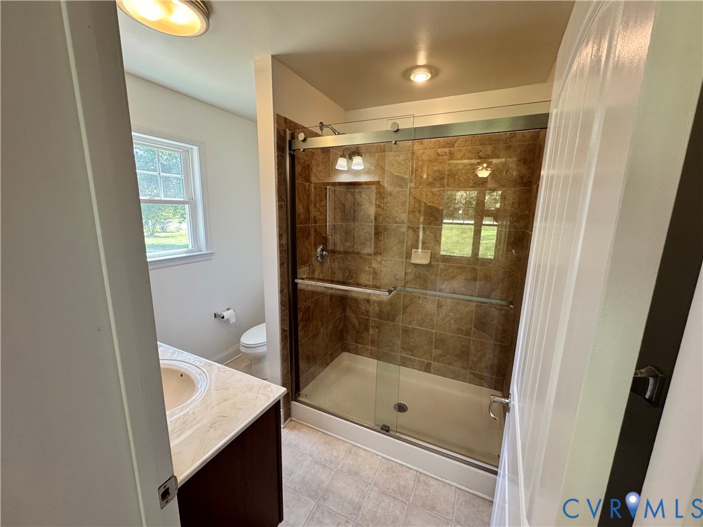 5541 Mary Ball Road Lancaster, VA 22503 - Photo 30 of 50 a bathroom with a shower and a sink