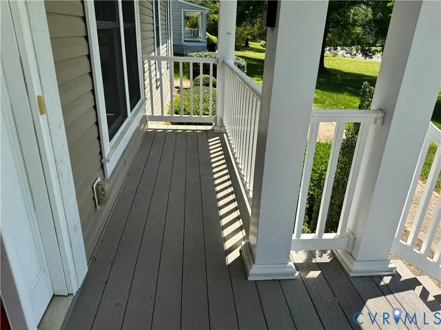 a view of entryway with stairs and wooden floor