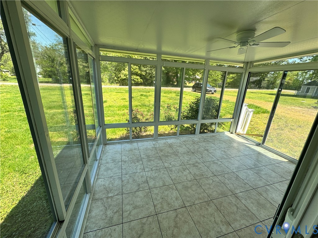 5541 Mary Ball Road Lancaster, VA 22503 - Photo 40 of 50 a view of an empty room with a floor to ceiling window