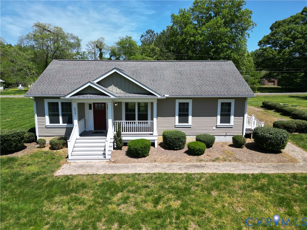 5541 Mary Ball Road Lancaster, VA 22503 - Photo 49 of 50 a house view with a seating space and garden view