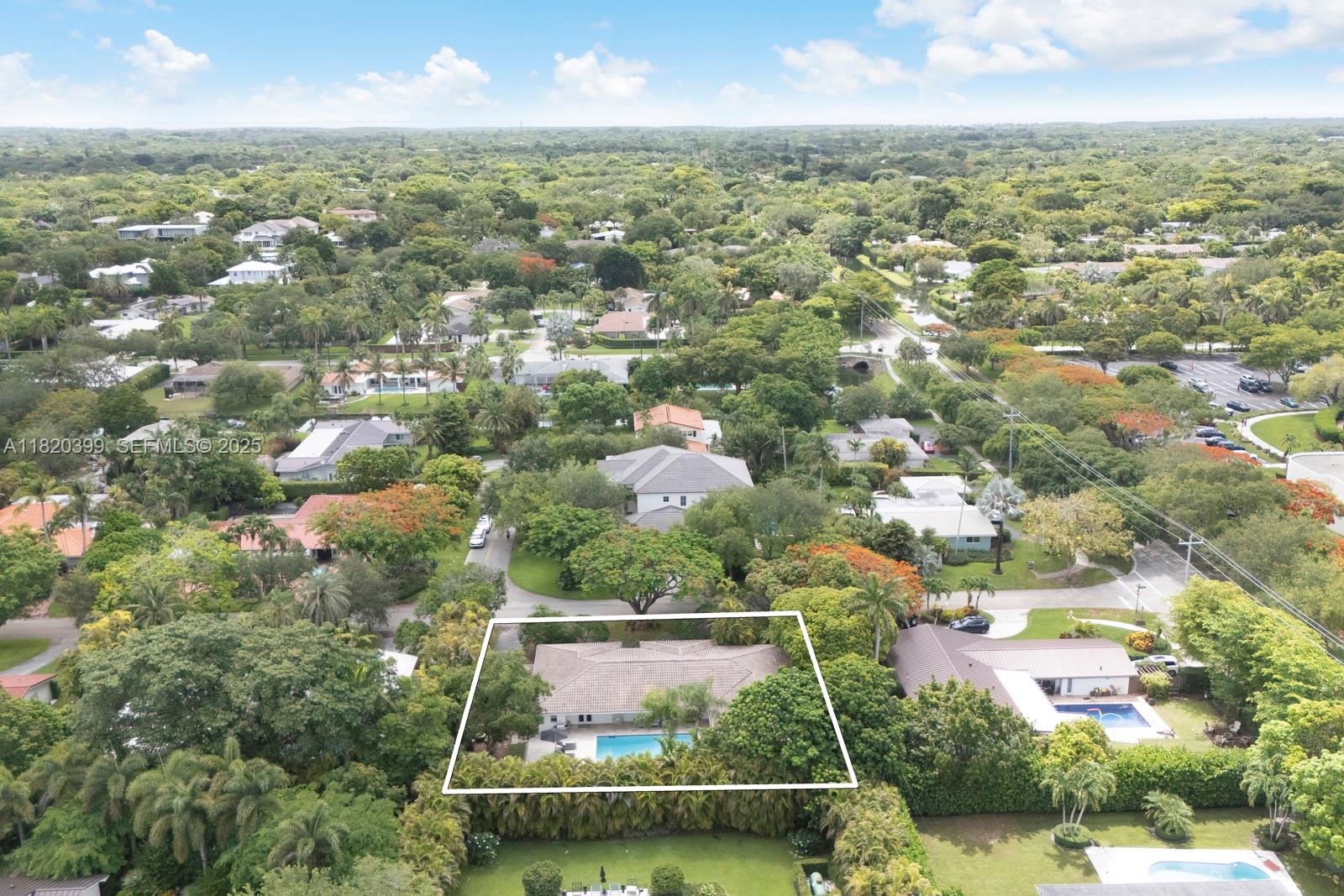 11900 Southwest 72nd Place Pinecrest, FL 33156 - Photo 36 of 37 an aerial view of residential houses with city view