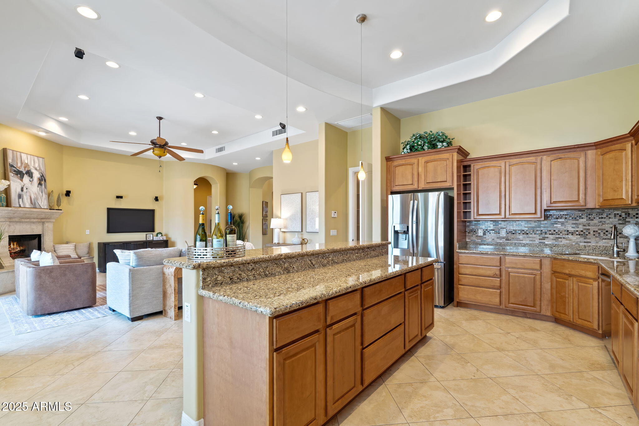 1535 West Winter Drive Phoenix, AZ 85021 - Photo 12 of 41 a kitchen with stainless steel appliances granite countertop a sink and cabinets