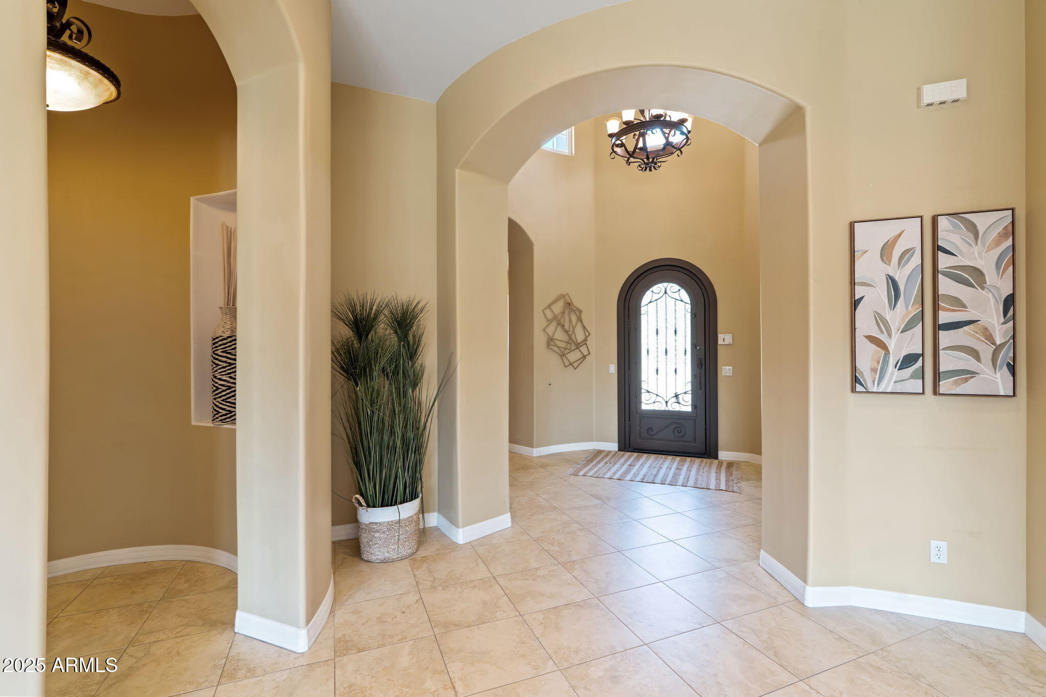 1535 West Winter Drive Phoenix, AZ 85021 - Photo 5 of 41 a view of a hallway with windows and chandelier