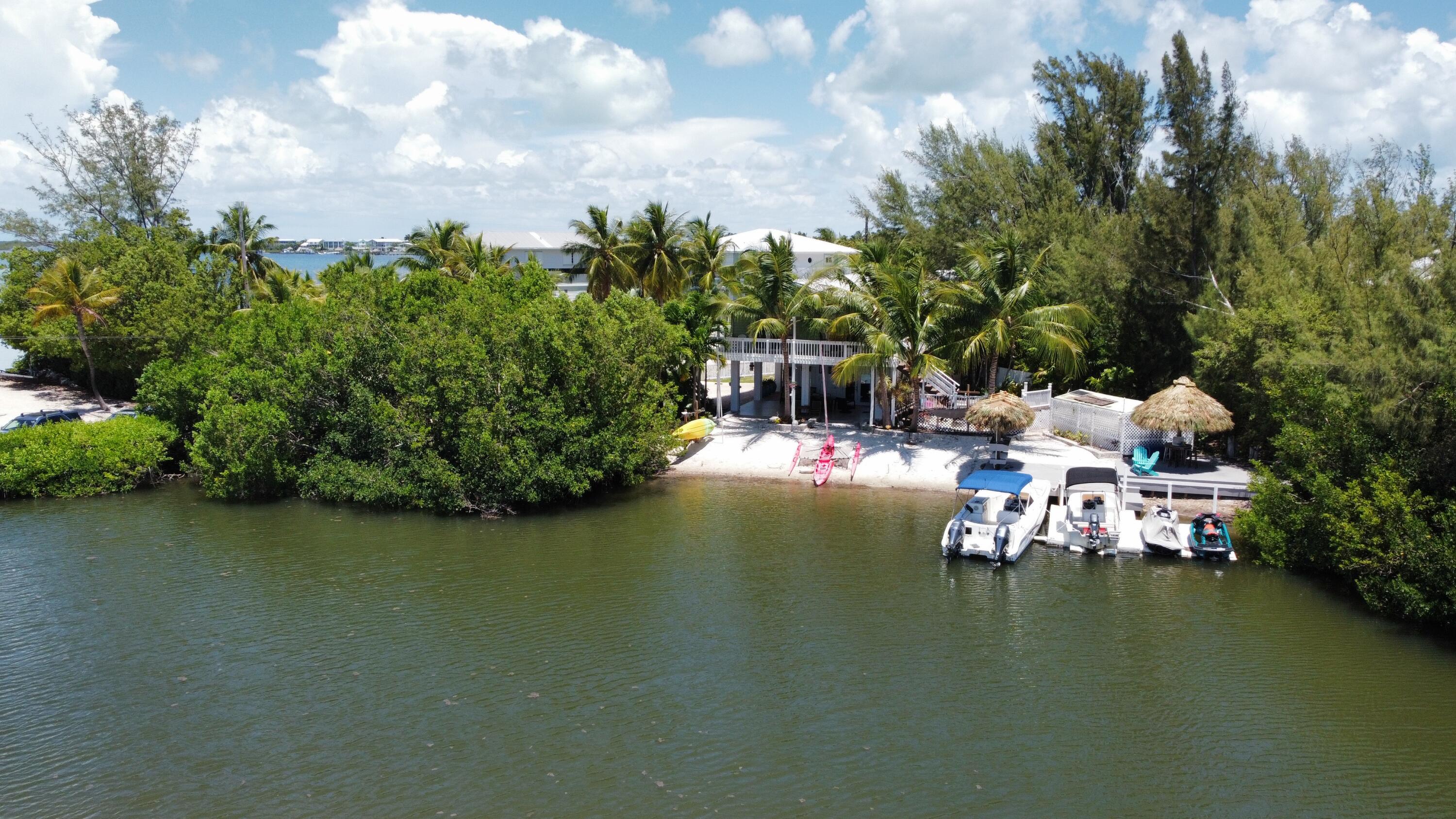 24 Bounty Lane Key Largo, FL 33037 - Photo 22 of 36 a view of a lake with sitting area