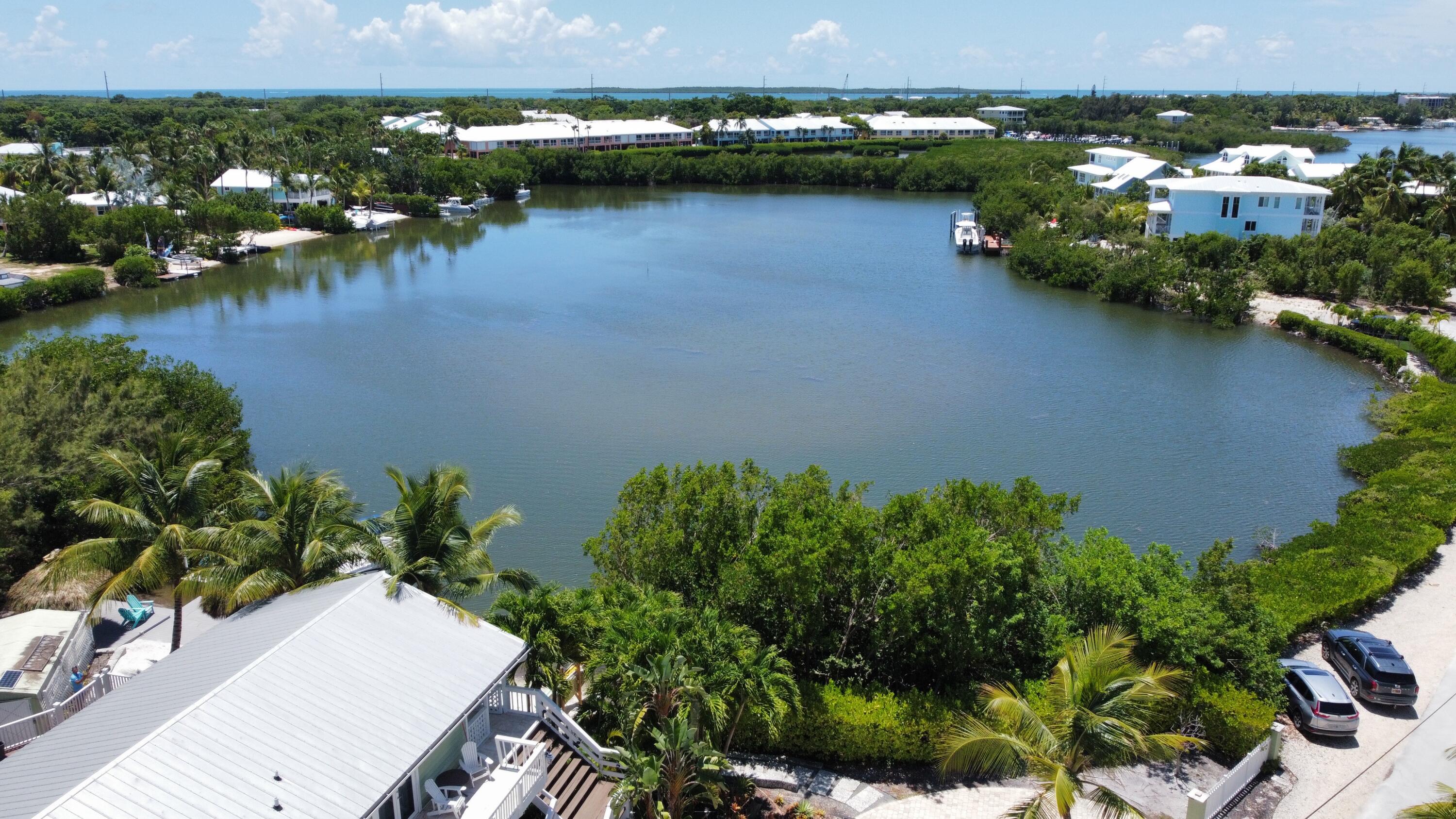 24 Bounty Lane Key Largo, FL 33037 - Photo 26 of 36 an aerial view of residential houses with outdoor space and lake view