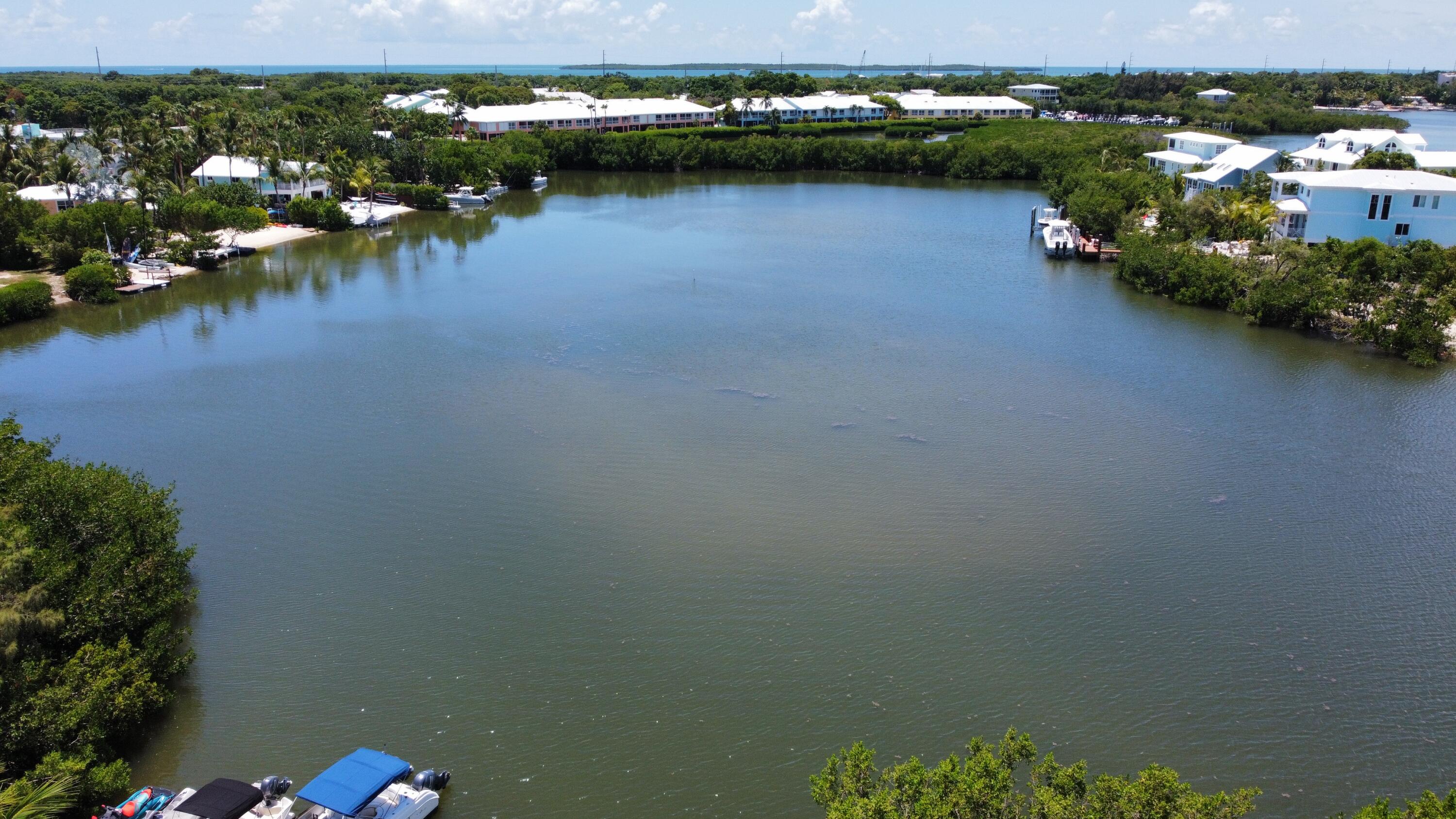 24 Bounty Lane Key Largo, FL 33037 - Photo 27 of 36 an aerial view of ocean and residential houses with outdoor space
